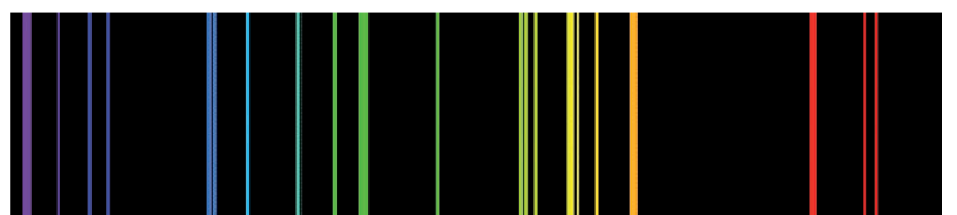Figura 1: espetro atómico do carbono na região do visível, constituído por riscas coloridas sobre fundo negro